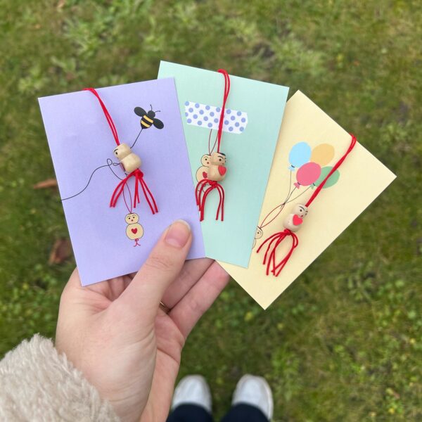 Set de poupées porte-bonheur pastel